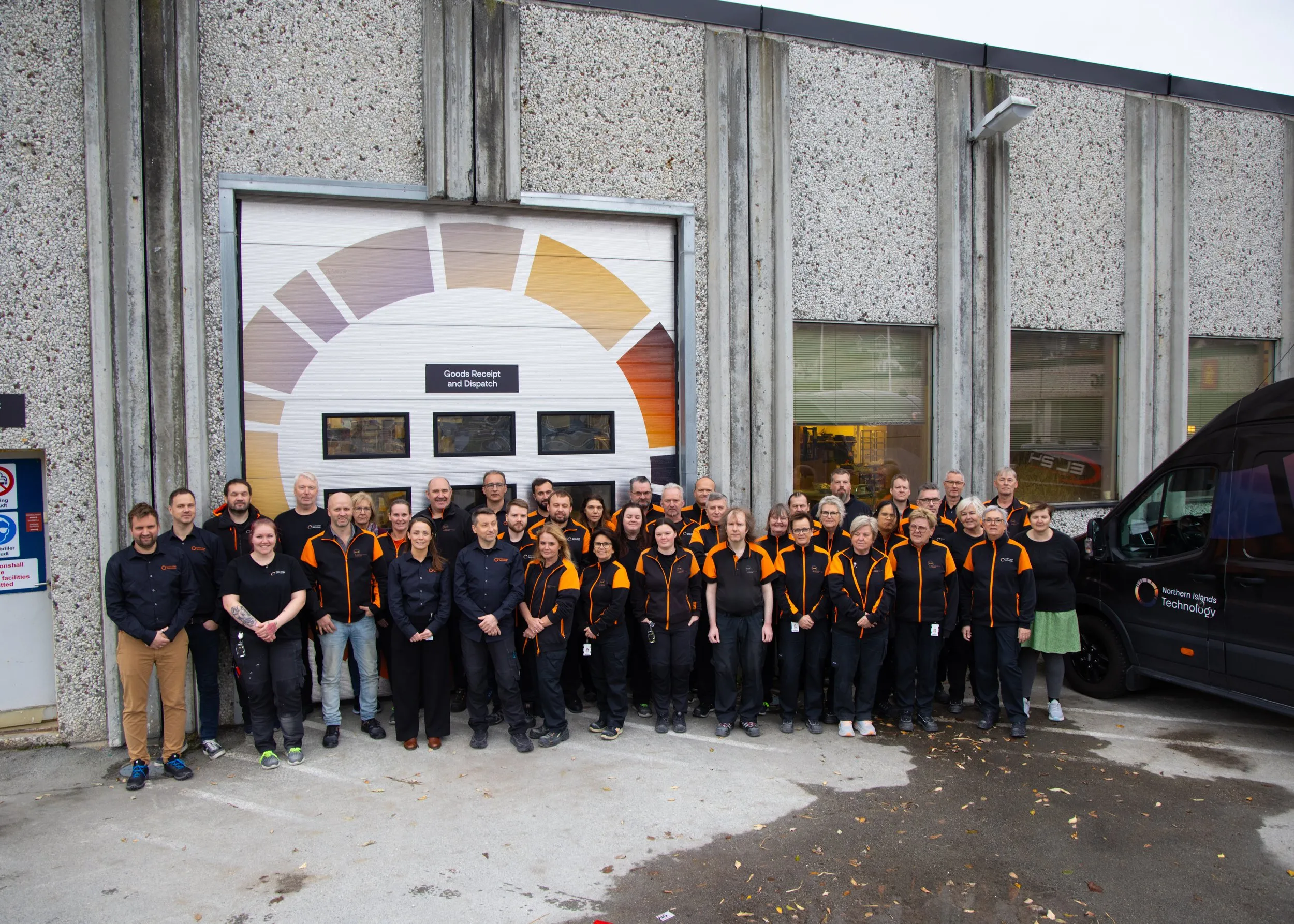 The Northern Islands Technology team gathered in front of their facility in Longva