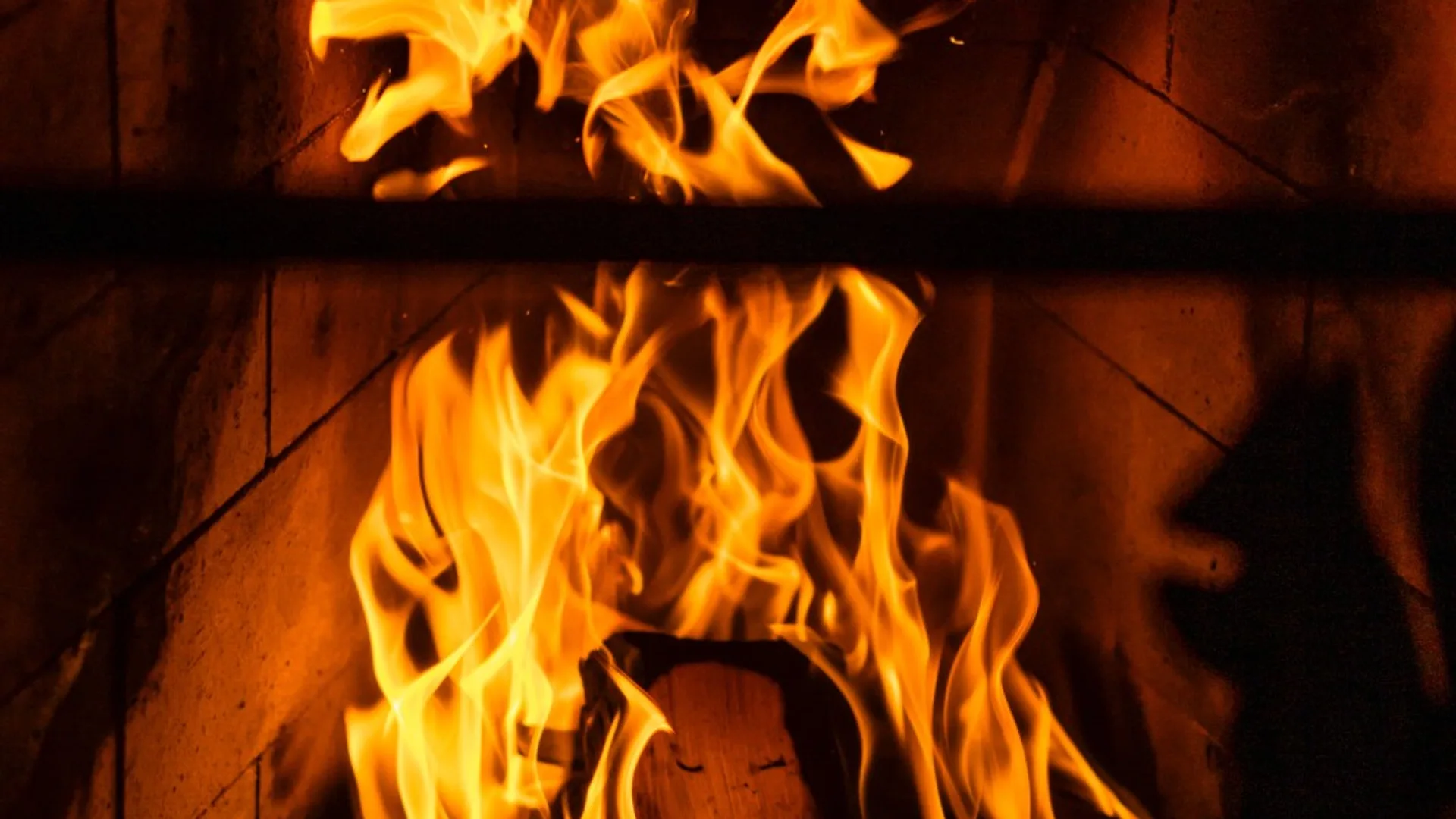 Crystal clear Norwegian lake surrounded by pine forests and mountains