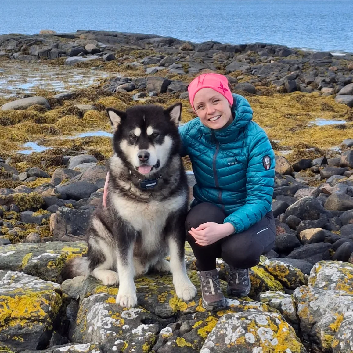 Viktoria Bergitte Bergtun with her Alaskan Malamute Kodiak on Lepsøya
