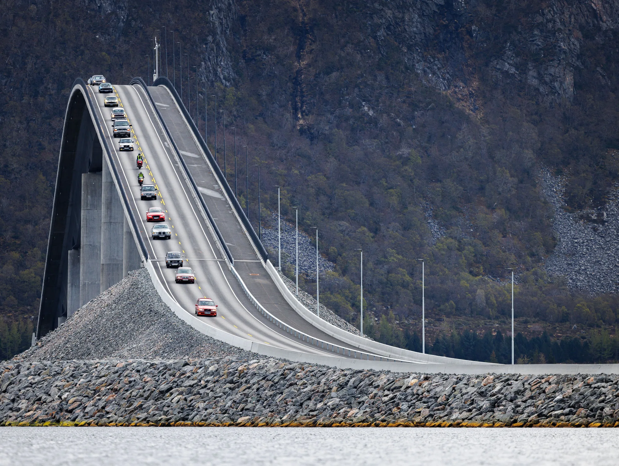The dramatic arch of a bridge connecting islands