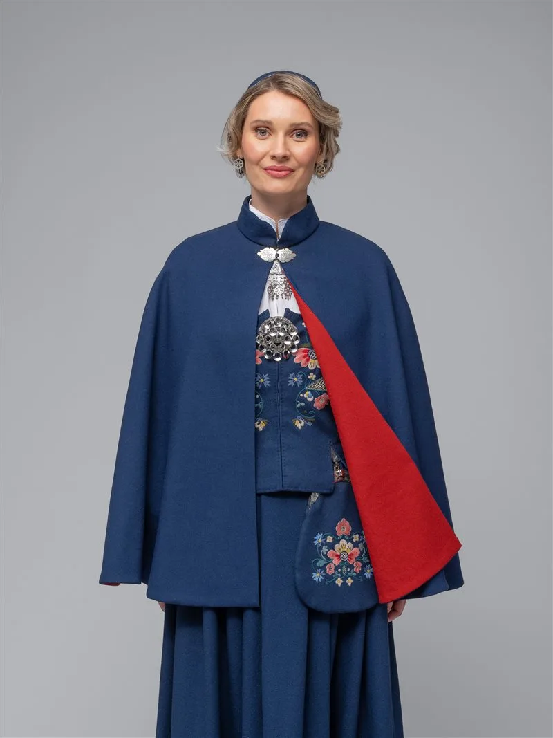 A woman in a Bolsøy bunad wearing the kep cape