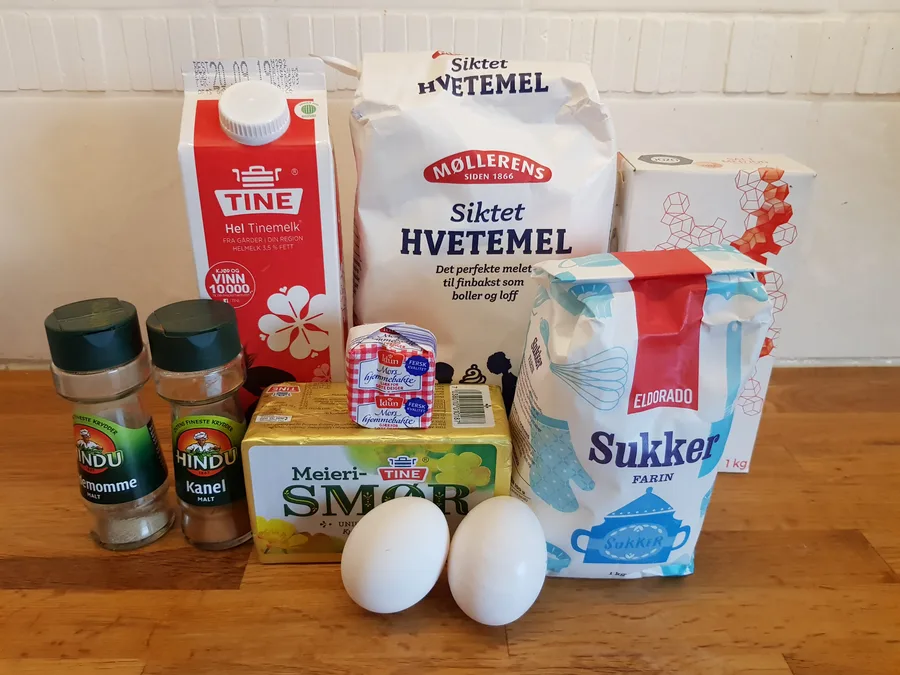 Norwegian baking ingredients: Tine whole milk, Møllerens flour, yeast, eggs, butter, sugar, cardamom and cinnamon