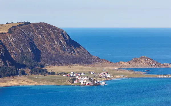 Coastal Norwegian island landscape with mountains and sea