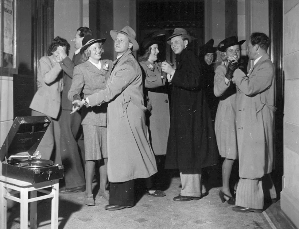 People dancing and rejoicing in the streets of Norway at the end of World War II