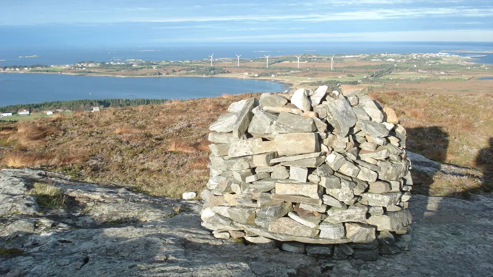 View from the summit of Harøyburet overlooking the island landscape of Harøya and Finnøya in Nordøyane
