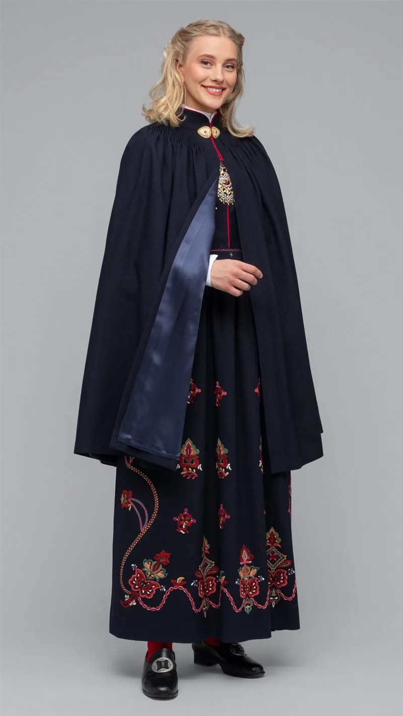 Woman wearing the traditional kep cape of the Sunnmøre bunad