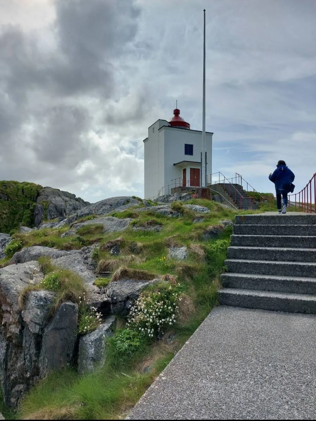 Stone stairs leading up to Ulla Lighthouse on Kvernholmen, a popular hiking destination