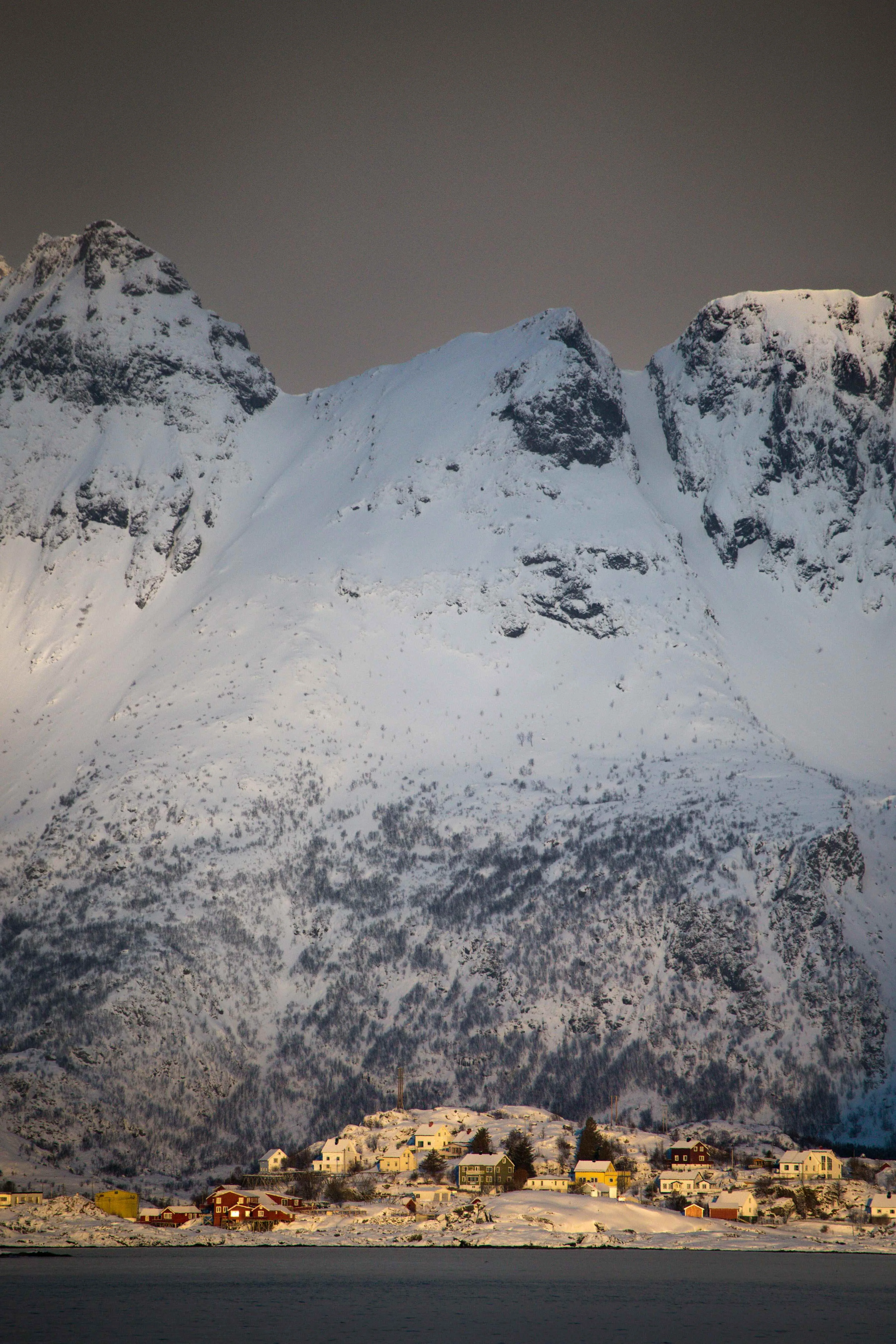 Snow-covered mountain landscape in Lofoten