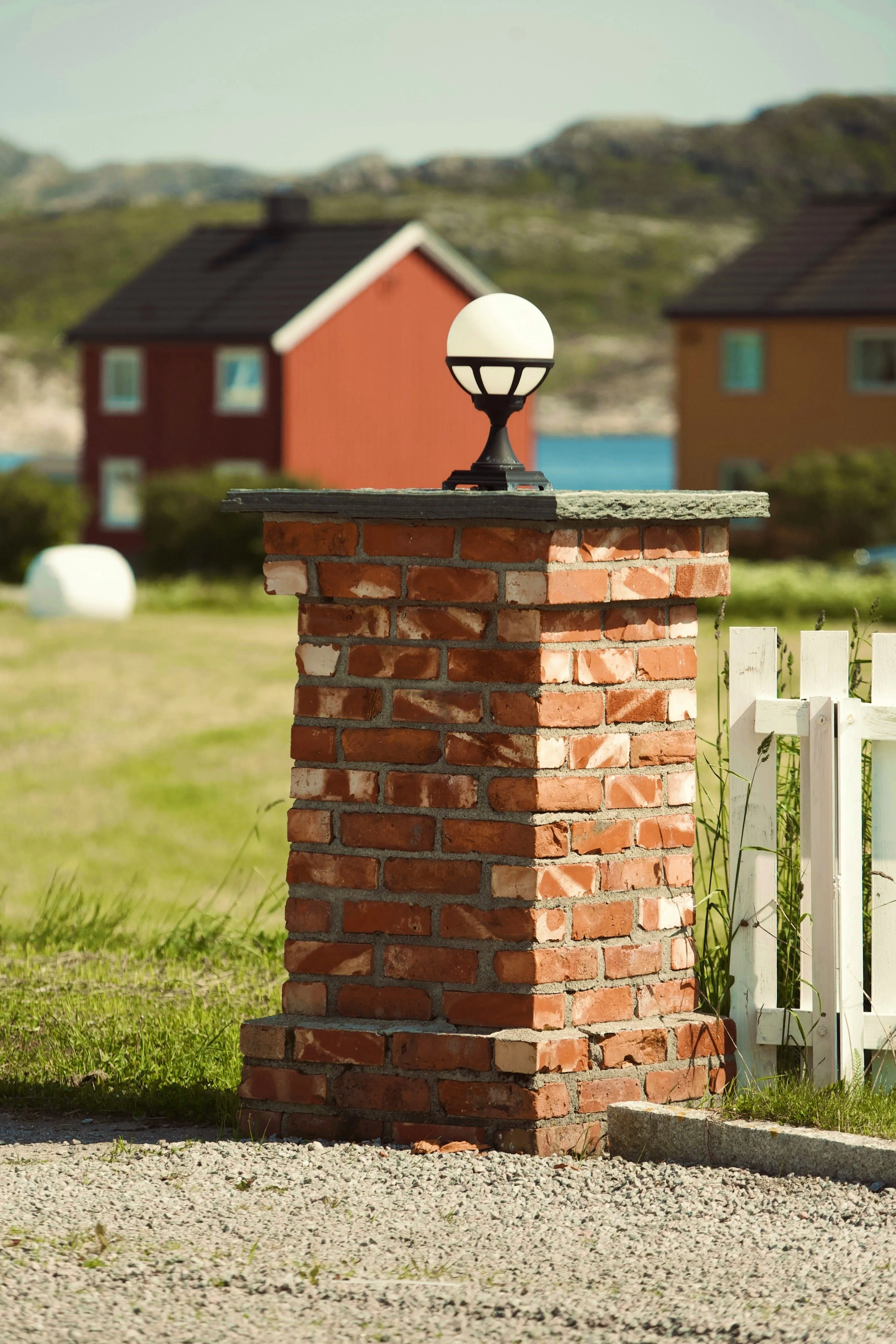 Lamp on a brick pillar in Abelvær