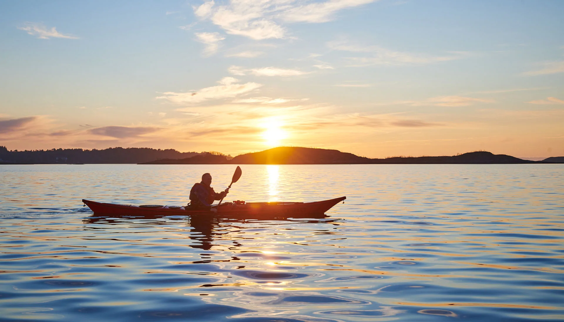 Kayaking along the coast of Aukra