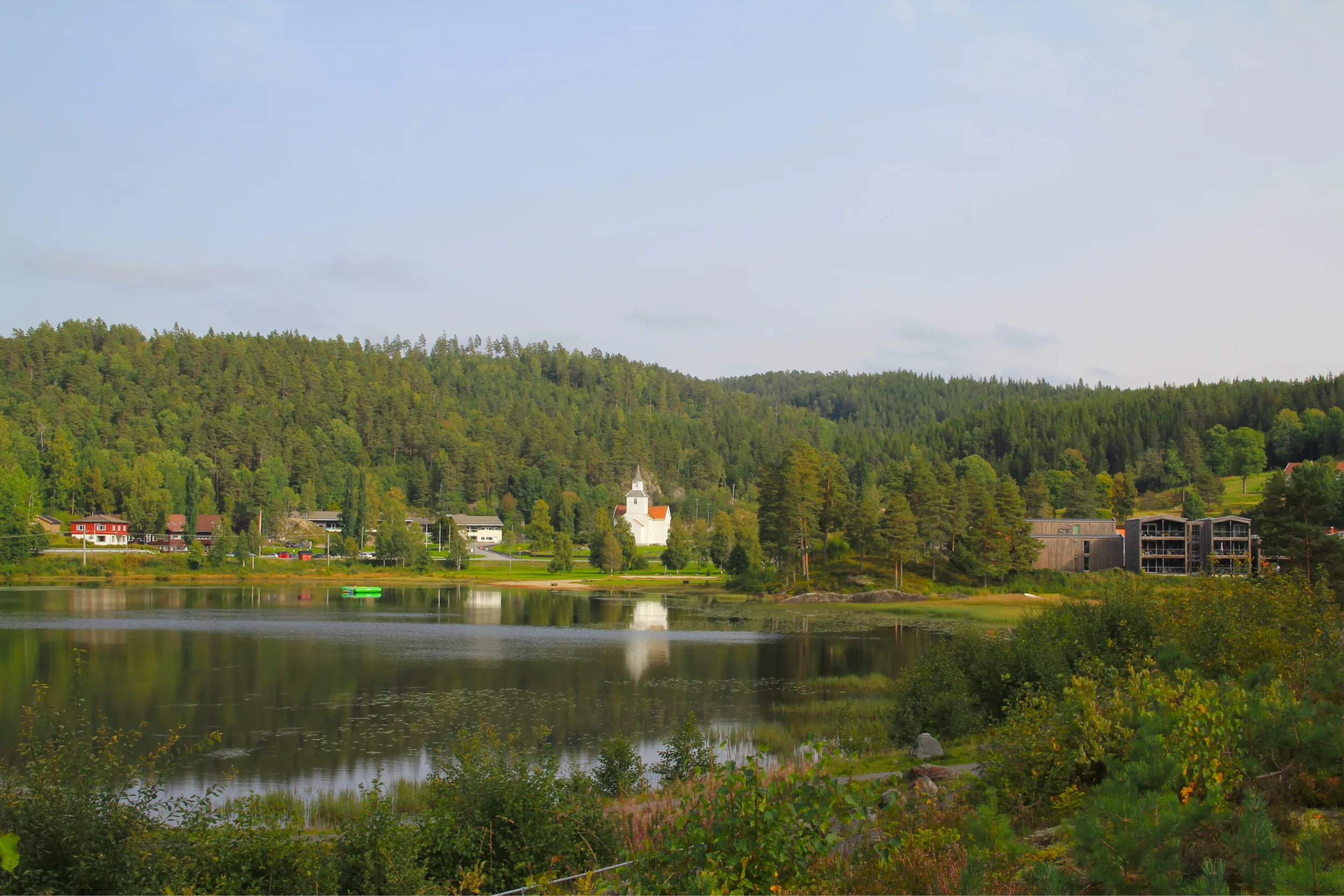 Birketveit village overview with lake and forest