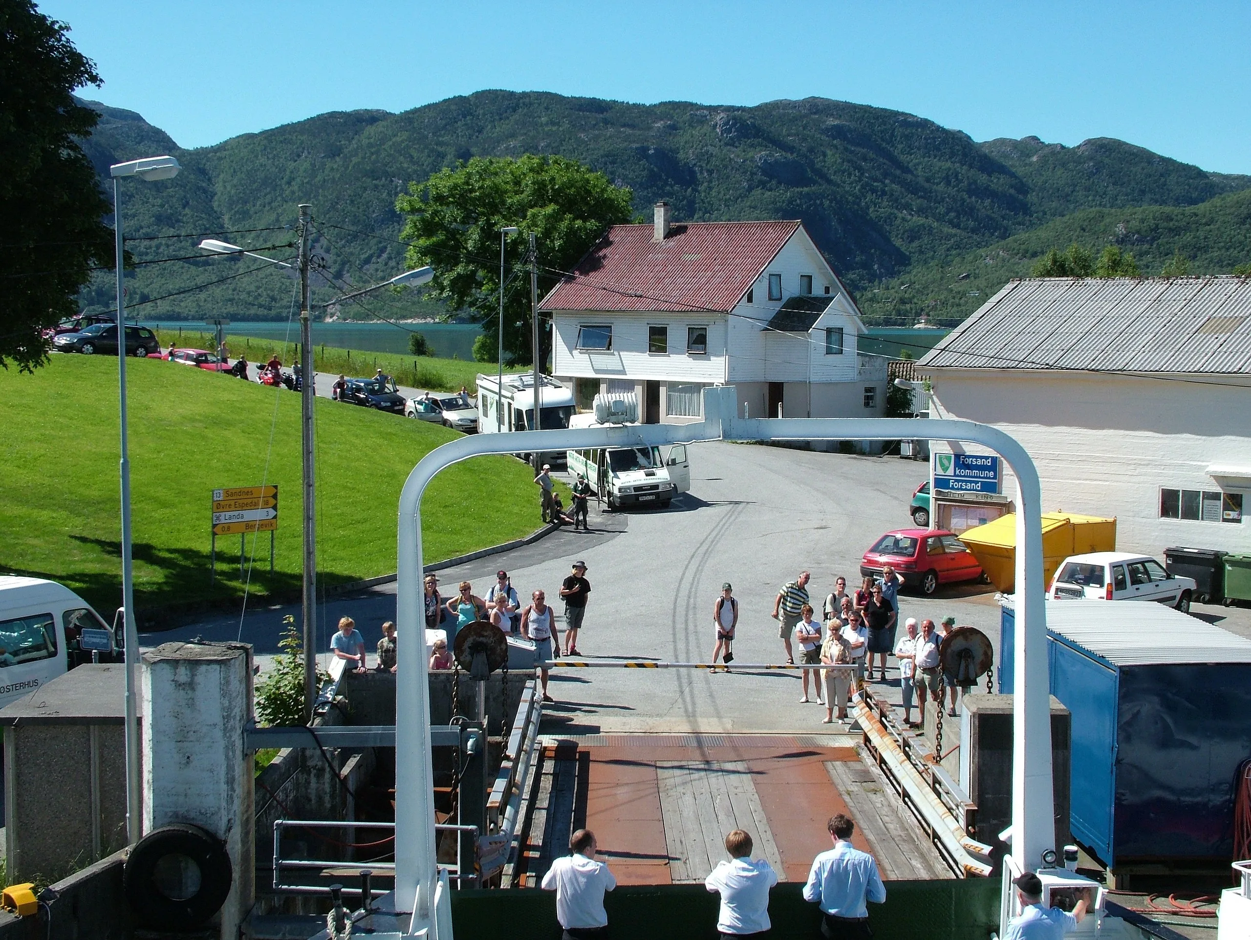 Ferry at the Forsand dock with mountains in the background