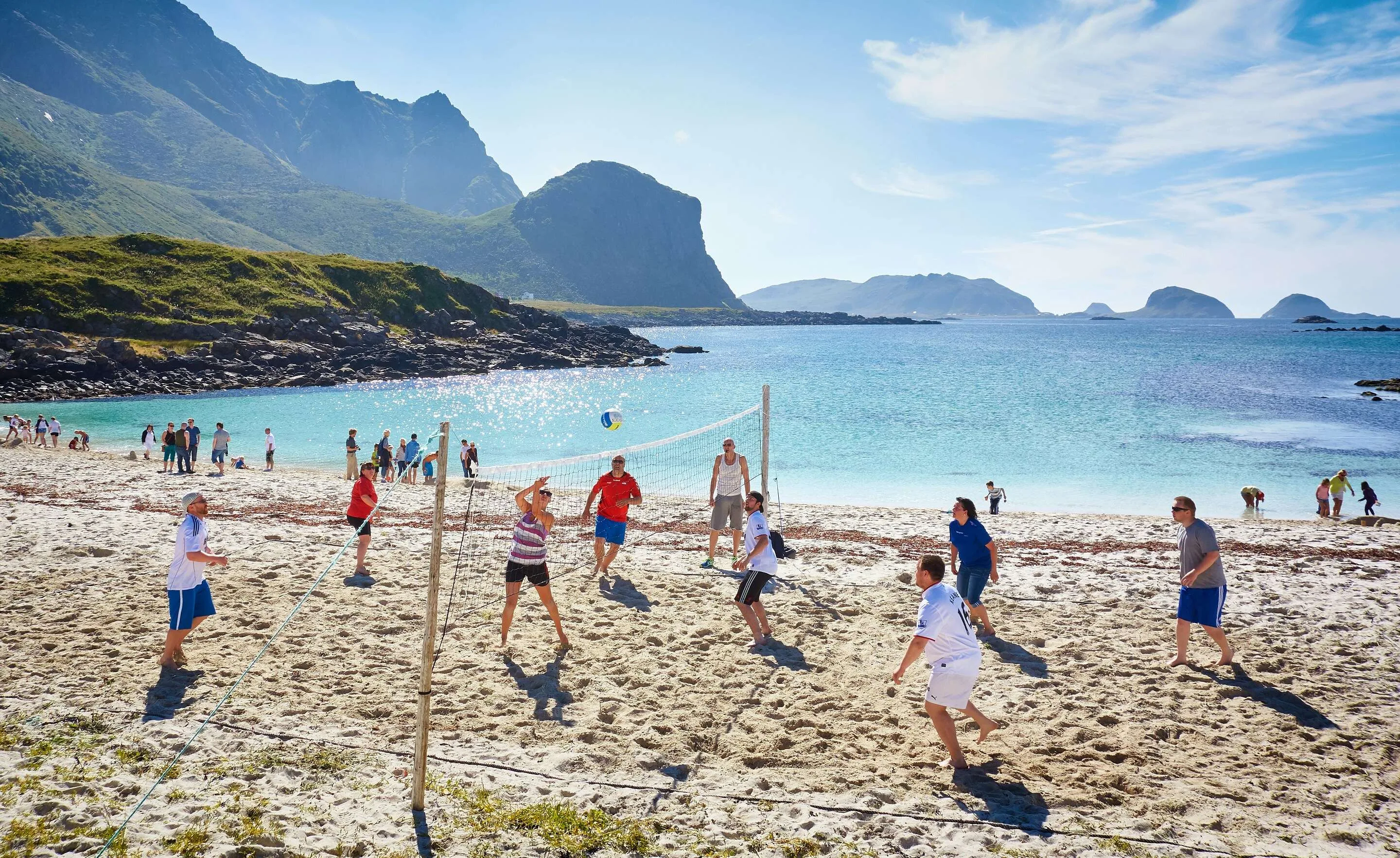 People playing beach volleyball at Hovden