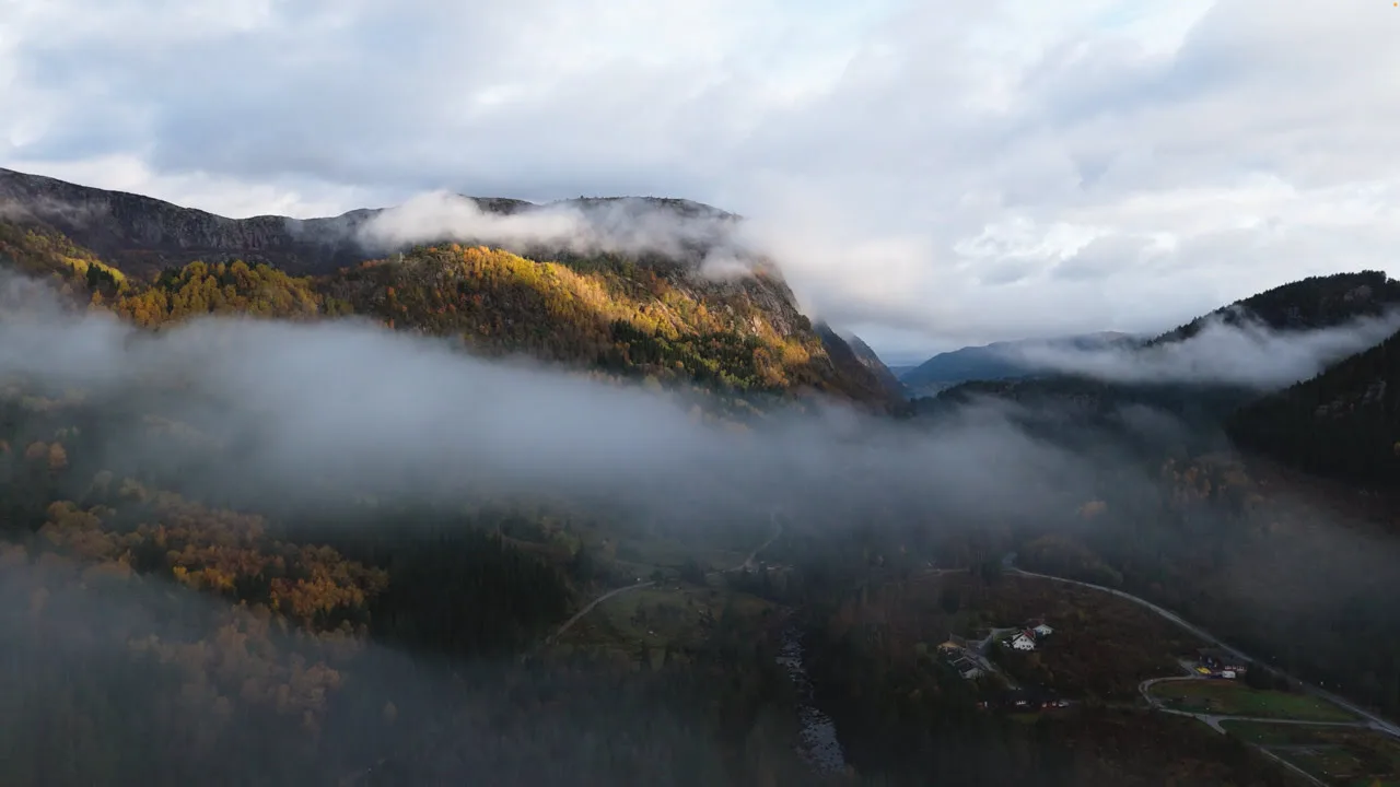 Mountains around Åseral partially covered by clouds