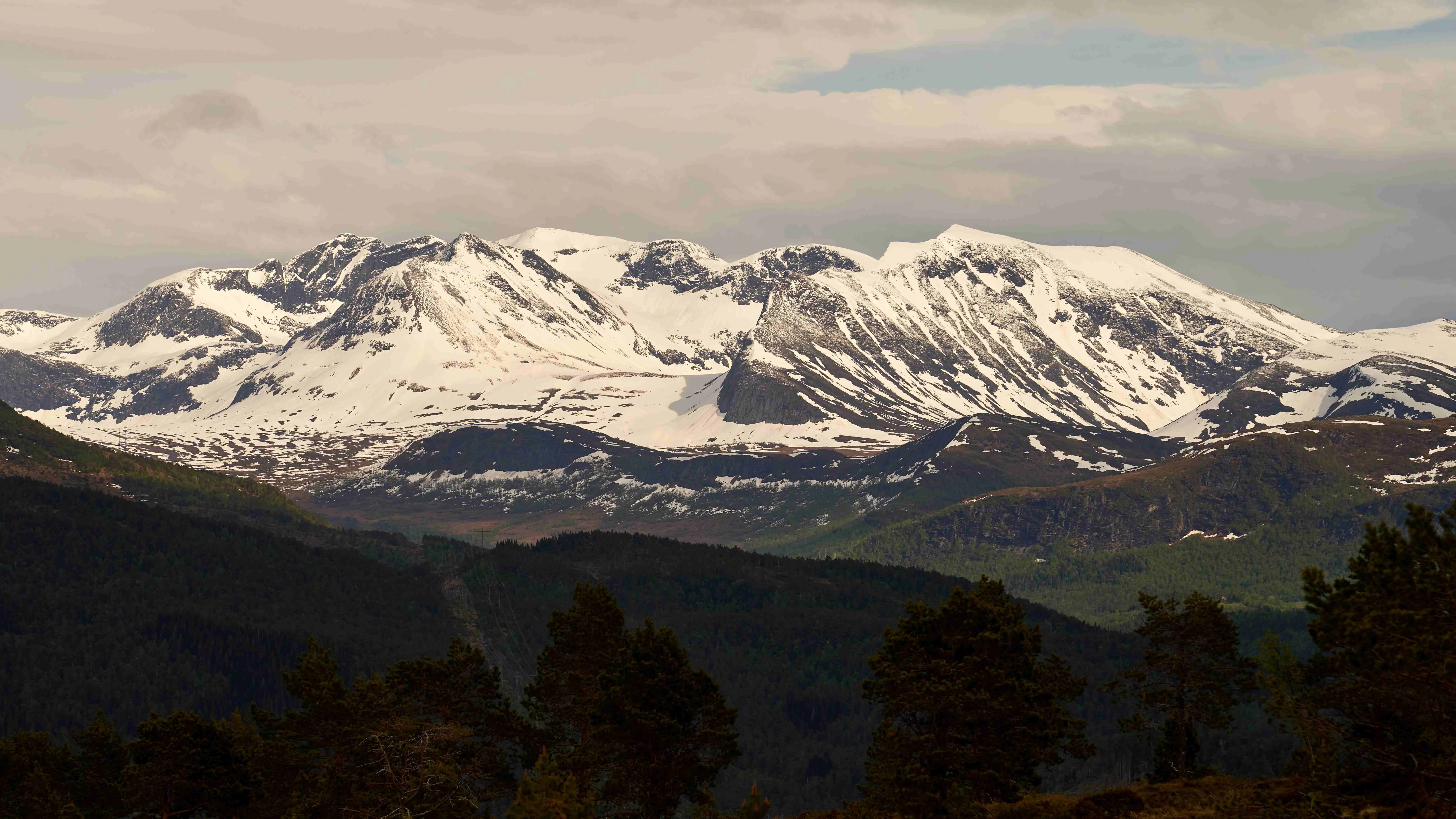 Snowy mountains near Sjøholt