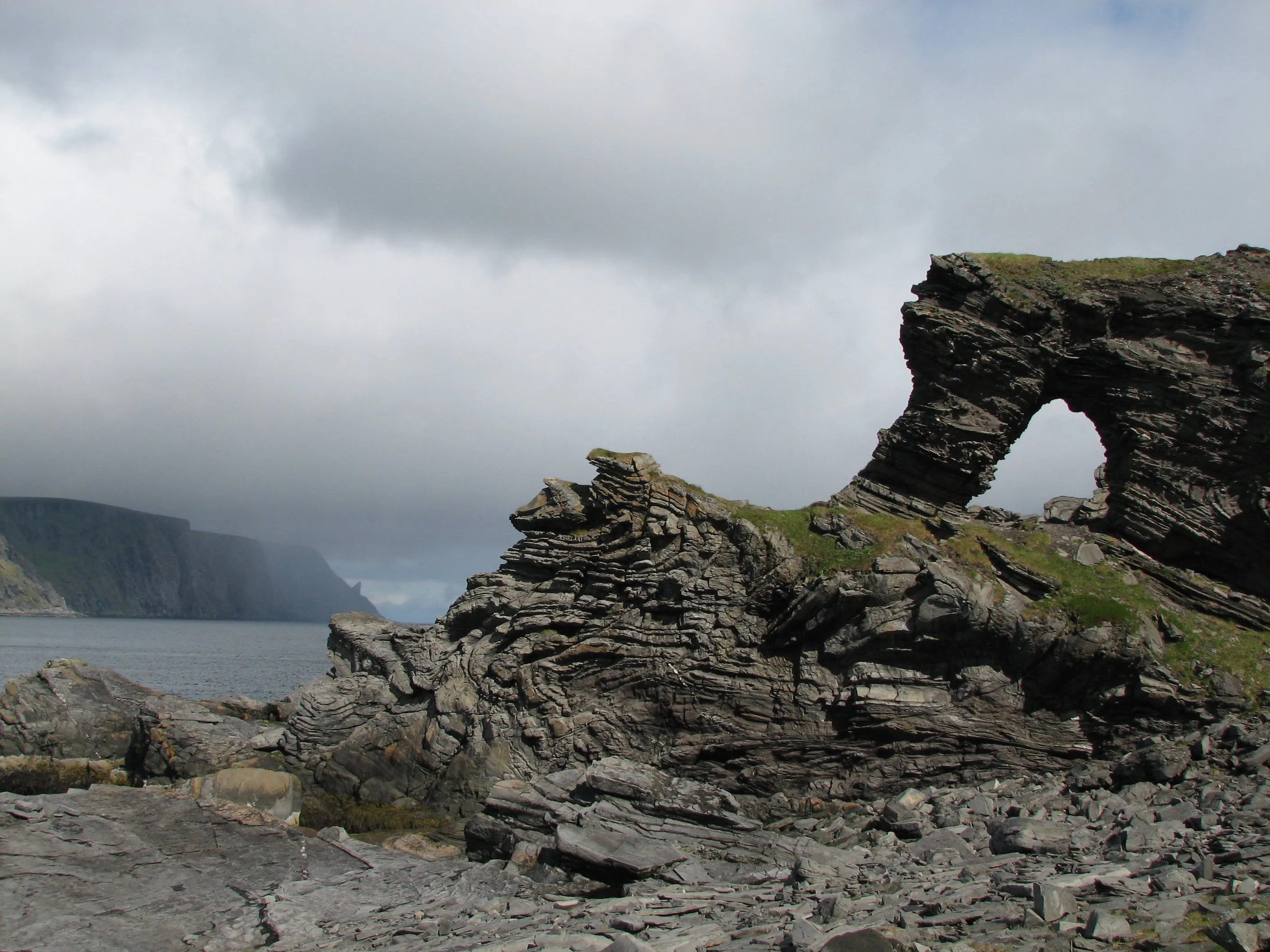 Kirkeporten natural stone arch with North Cape view