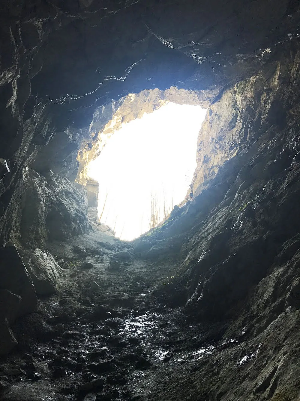 Hamnsundhellaren cave with daylight streaming through