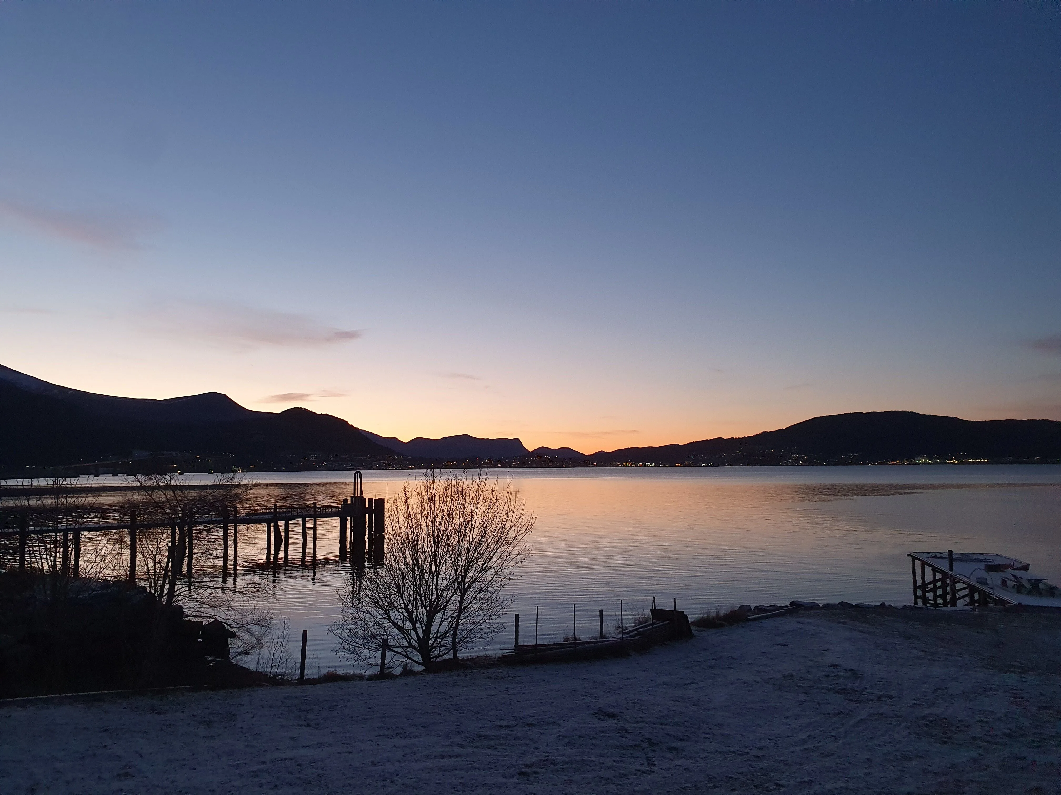 Fjord shoreline in winter light near Vikebukt