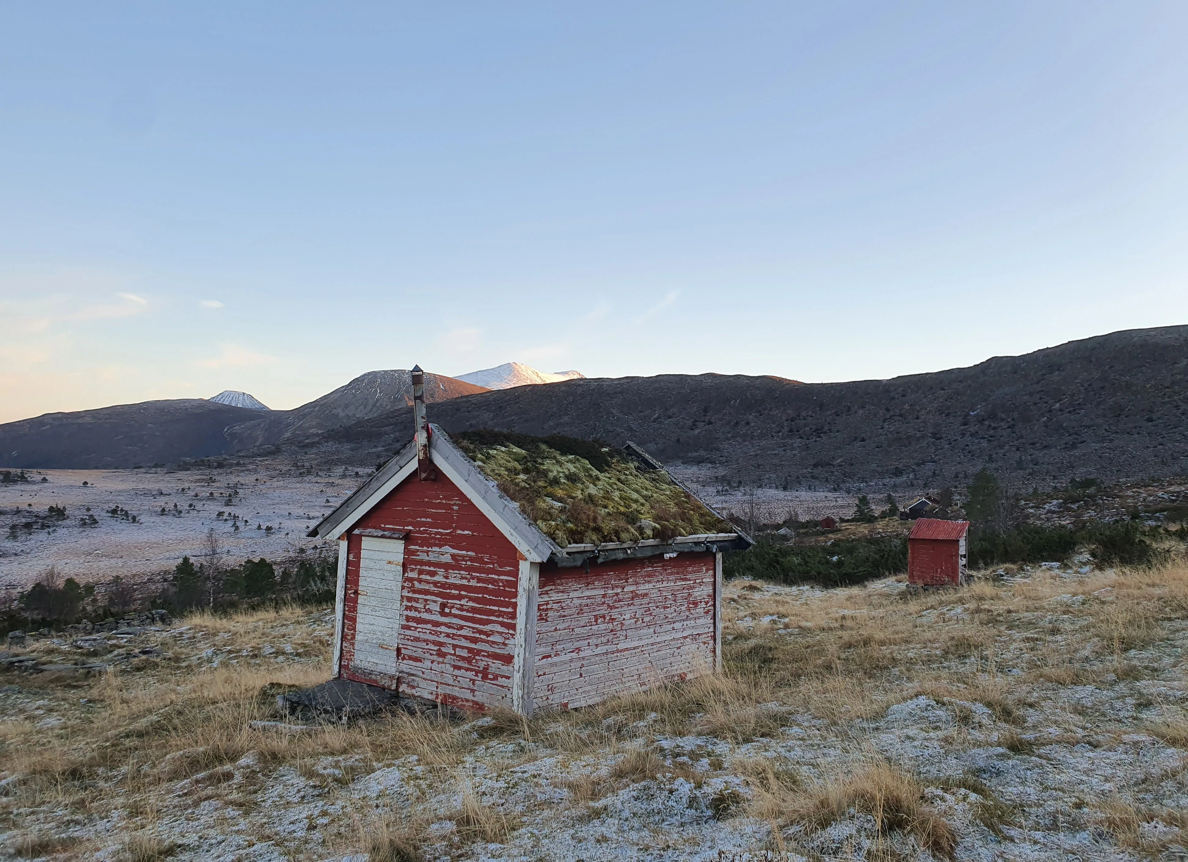 Fjord at dusk in Vikebukt with a pale orange horizon
