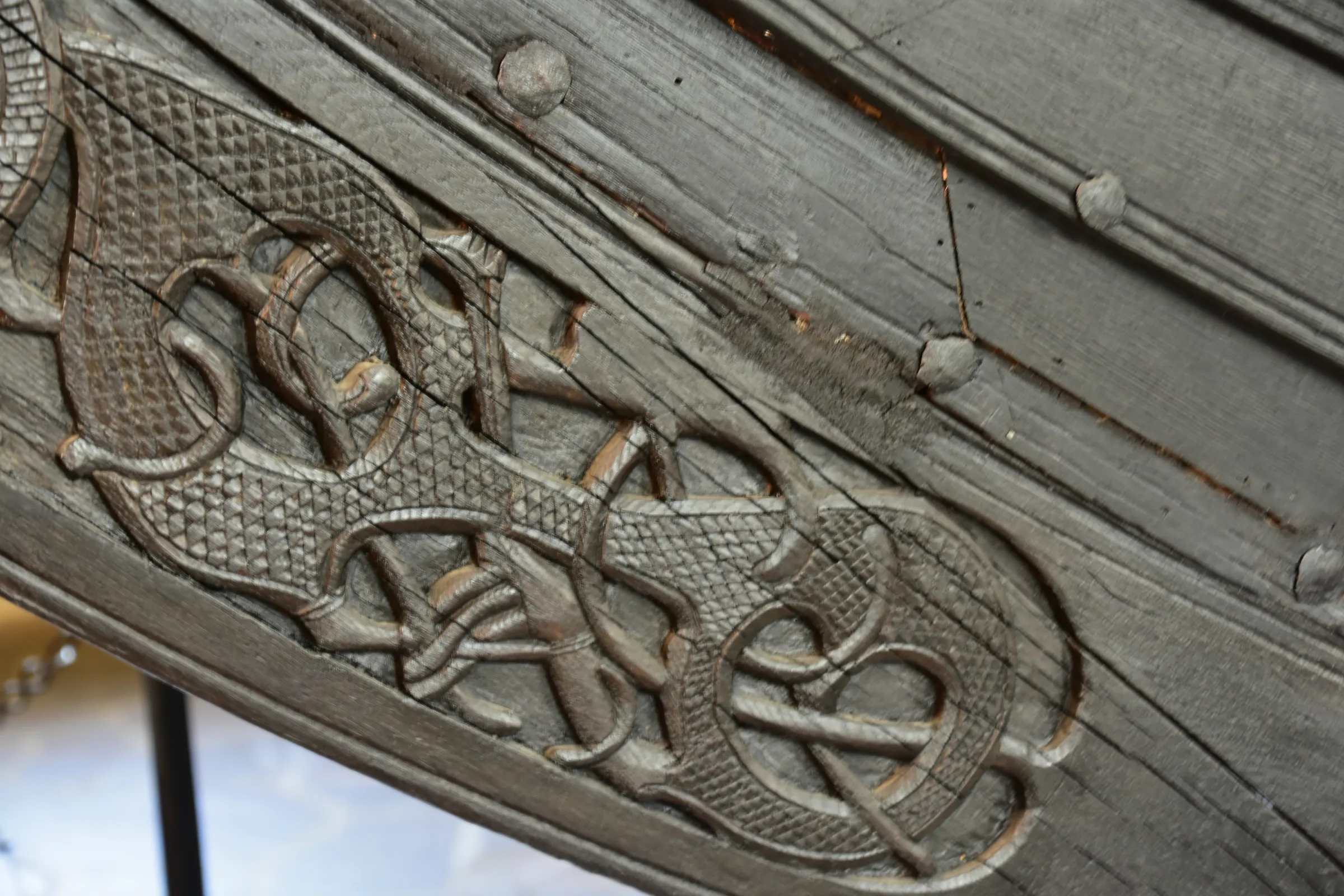 Close detail of carved ornamentation on the Oseberg ship